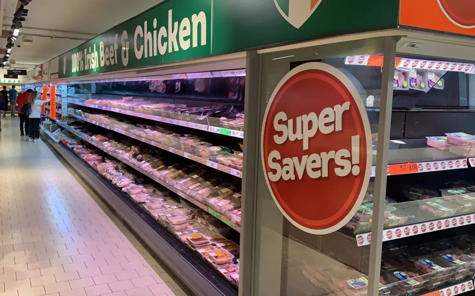 Supermarket chilled meat display cabinets fully stocked
