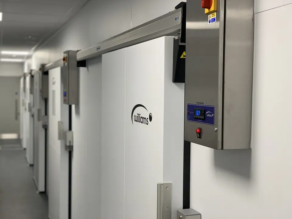 Insulated walk-in freezer room doors with digital temperature controllers installed by ChillTech